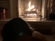 Sexy ass bitch sucks cock in front of the fireplace