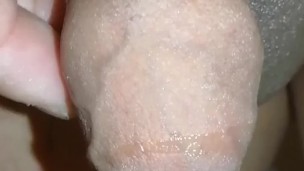 Slowmotion precum drool with foreskin hanging up close and personal