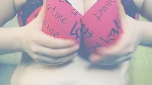 Chubby girl shakes her tits for camera