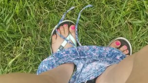 Short Girl Standing Pee Outside In Grass