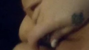 Dirty girl fucks herself with a glass dildo