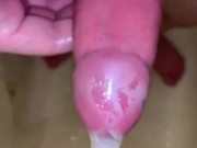 Filling up a condom in the shower