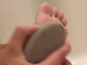 Teen Scrubs Feet With Foot Rock + Lotions