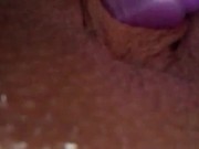 Masturbating using double headed vibrator