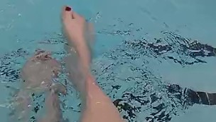 Kitty's splashes in pool
