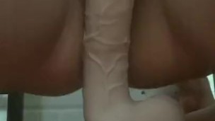 Amateur tight pussy riding big fat dildo