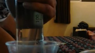 Limp sissy getting an enema with her own pee