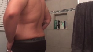 Chubby FTM plays with nipples rubs body and pussy
