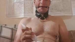 Slave Tom extreme ballstretch with cumshot