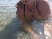 Naked boobs at public beach. Wet big tits