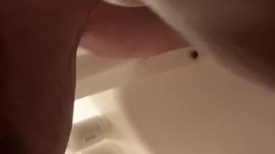 Oral cumshot in the shower