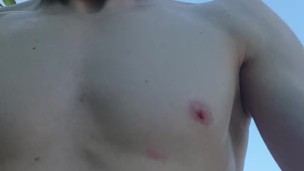 Completely, permanently hairless slave at a public nude beach