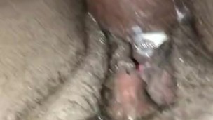 Masturbating