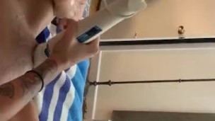 Pierced and tattooed college girl squirts while masturbating