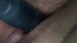 Slut fucks pussy with vibrator