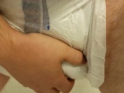 Playing with my diaper filled to the max