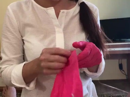Escort girl gives a blowjob in latex gloves