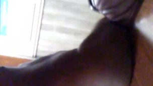 Black man walking naked in public at work