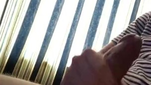 Beating my dick and cumming on my stomach