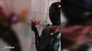 Latex Rubberdoll takes a shower
