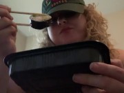 Fat bitch eats sushi