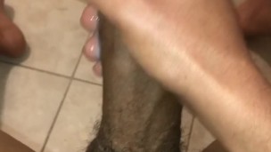Young man playing with his big cock