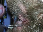 Dripping wet extreme hairy cunt with big clit after cumming on cock