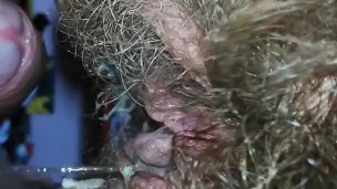Dripping wet extreme hairy cunt with big clit after cumming on cock