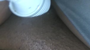 Ebony chick masturbates with wand toy