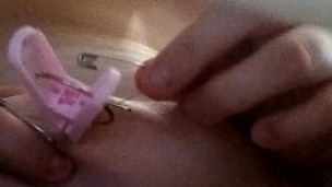 teasing nipple with clothes pin