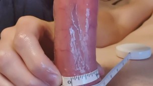 Measuring tape around my throbbing cock