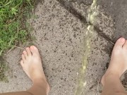 Babysitter Standing Pee Outside On Public Sidewalk