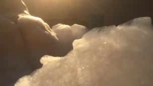 Curvy amateur too busy on her phone to notice she’s on camera.