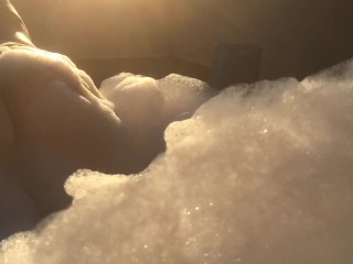 Curvy amateur too busy on her phone to notice she’s on camera.