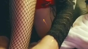 Sexy Blonde Trap putting on Red High Heels