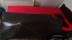 Rubberdoll get in Vacbed with gloves
