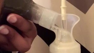 Milking boobs during bathroom break