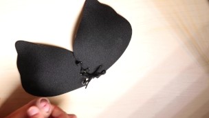Cumshot on her black bra
