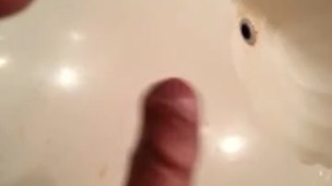 Amateur Latino stroking uncut cock for dripping cumshot in bathroom