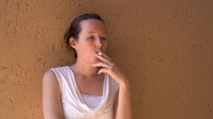 Lady Enjoying a Cigarette