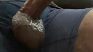 Black guy jerking thick dick oozing precum and cumload