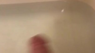 Stroking my soft cock in the bathtub with soap 