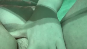 Thick teen playing with herself underwater in public pool