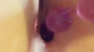 Fucking my ass with pink anal beads 