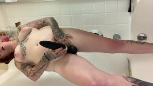 Wet and horny red head squirts in the shower