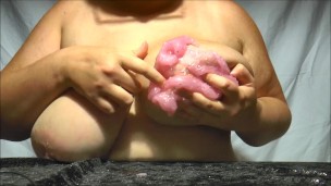 Squishing and squeezing beaded slime in my heavy boobs slimy ASMR