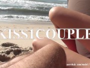 Oiled handjob on beach with cumshot