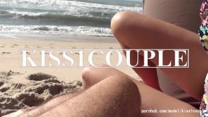 Oiled handjob on beach with cumshot
