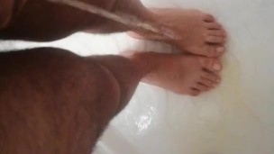 With my big cock, I pissing on my feet