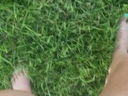 Girl Pees While Walking In Grass